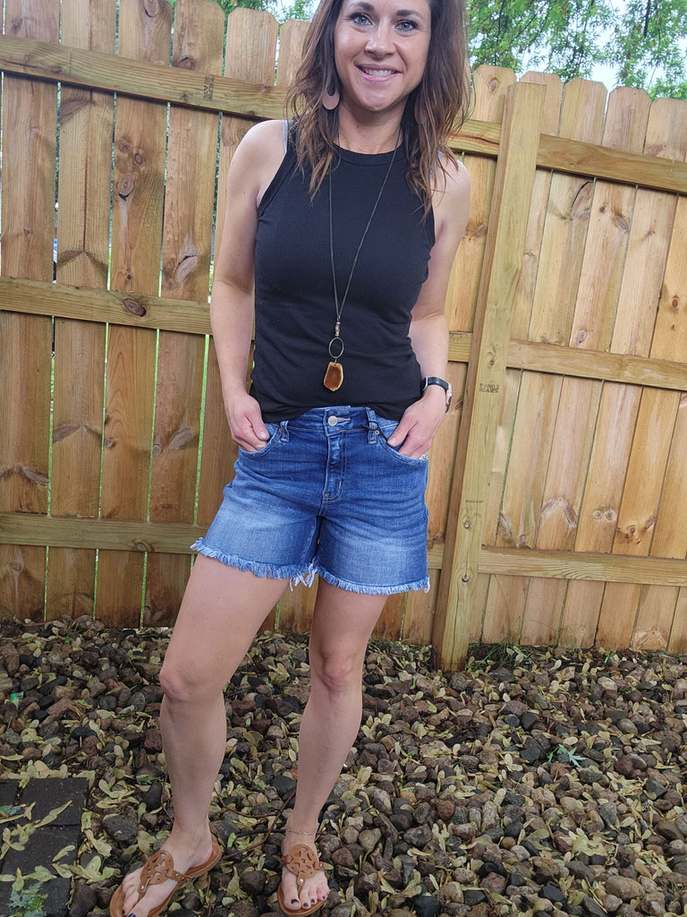 Mid rise frayed hem denim shorts