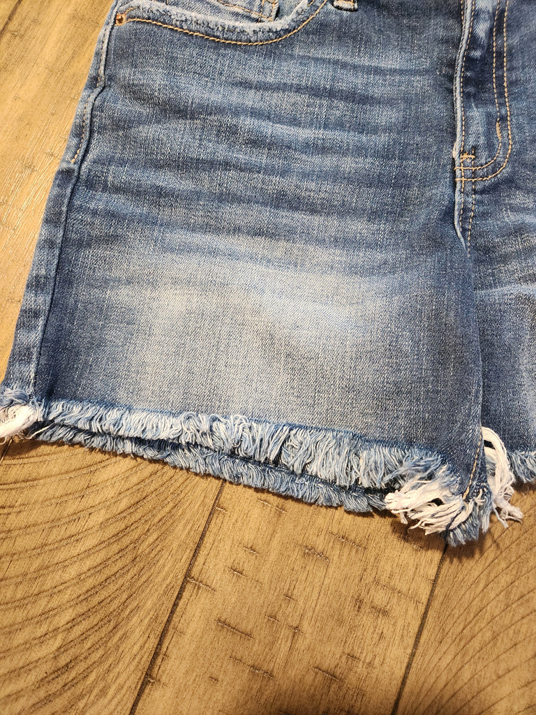 Mid rise frayed hem denim shorts