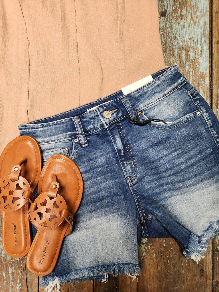 Mid rise frayed hem denim shorts
