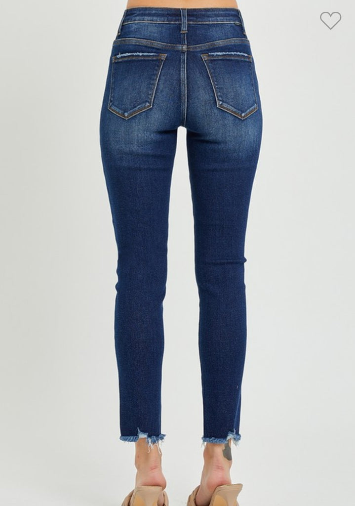 Risen Mid Rise Button Fly Raw Hem Skinny Jeans